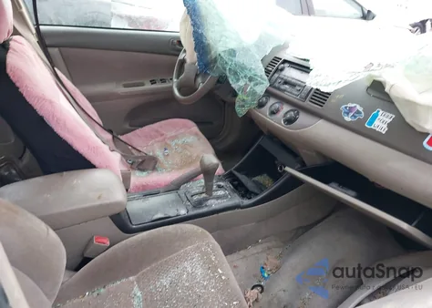 2003 Toyota Camry Le z USA, uszkodzony, nr VIN JTDBE32K930195126